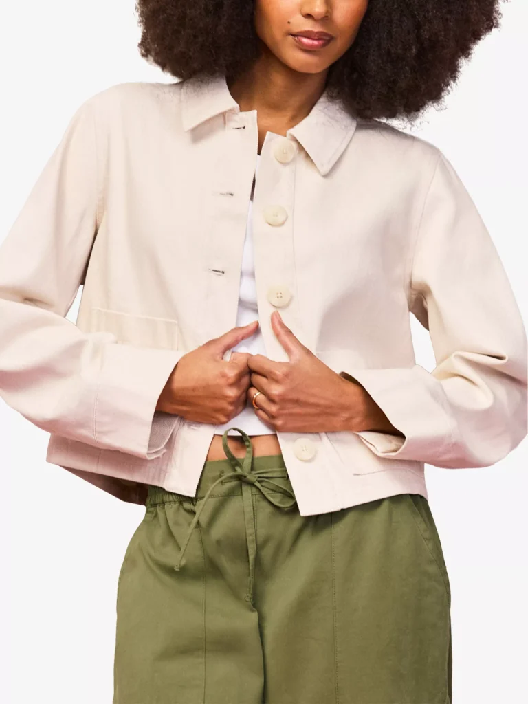 RO&ZO shirt-collar cotton-twill denim jacket in ecru styled with olive green drawstring trousers